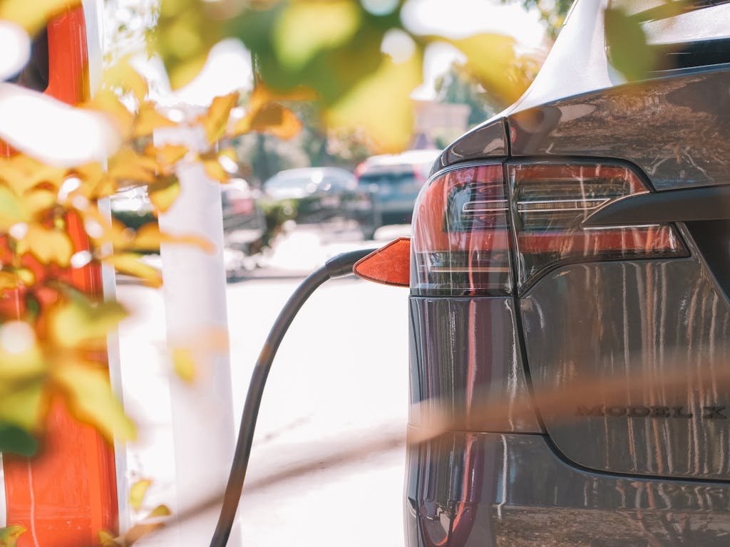 Close-Up Shot of an Electirc Car Charging